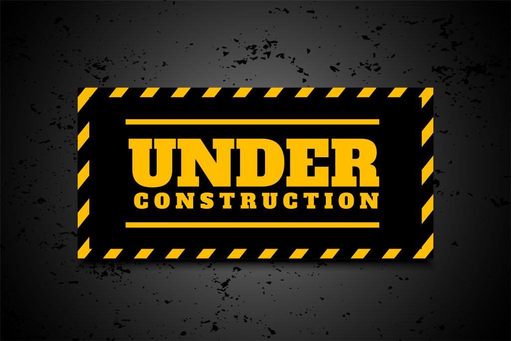under construction industrial background in yellow black stripes